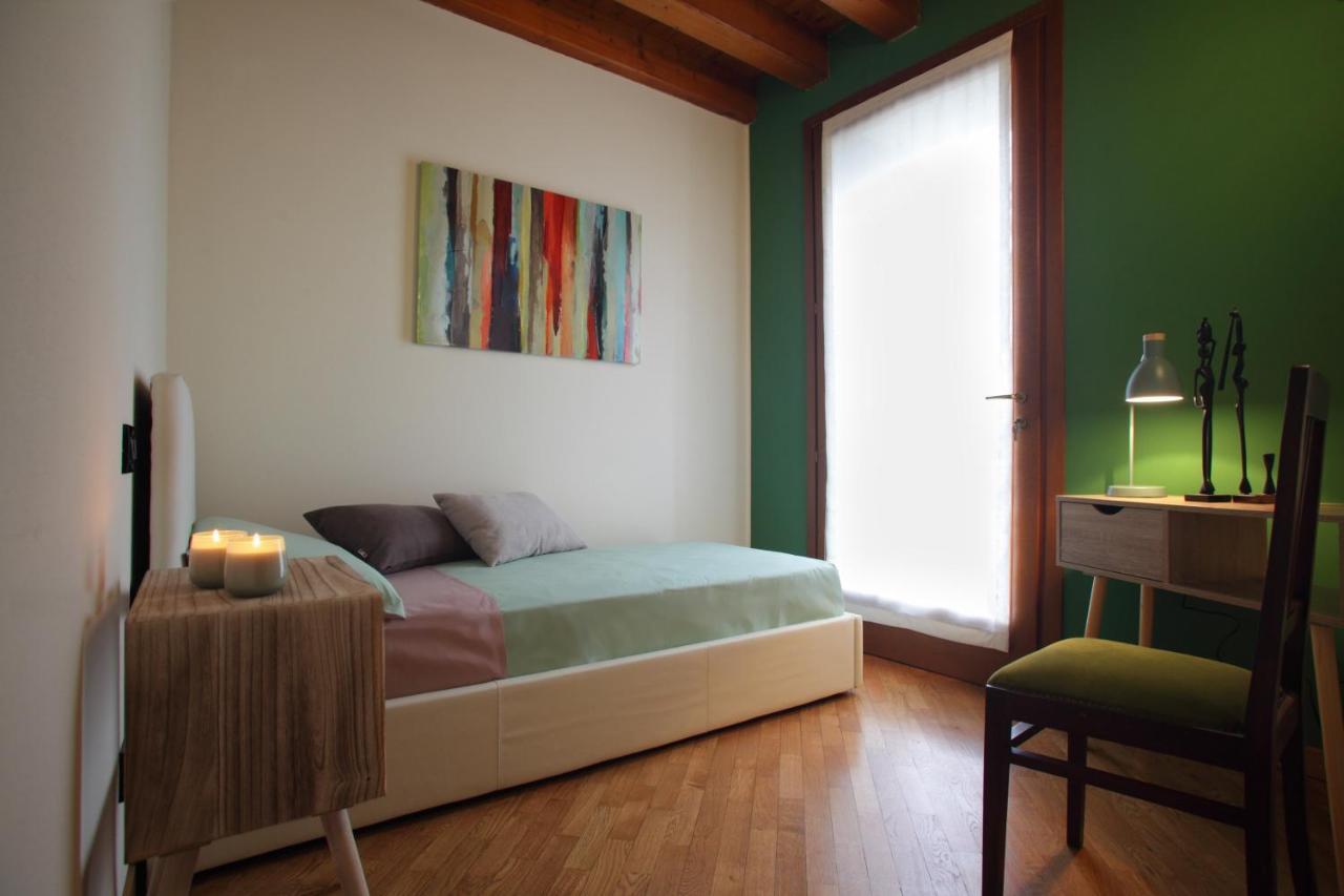 Villa Tiziano Residence Rosa Bagian luar foto